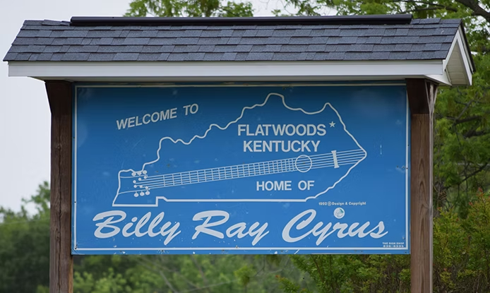 Flatwoods Kentucky Sign Featuring Billy Ray Cyrus