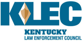 Logo for the Kentucky Law Enforcement Council (KLEC), featuring bold blue letters 'KLEC' with a gold badge shape inside the 'K', and the full organization name written below.