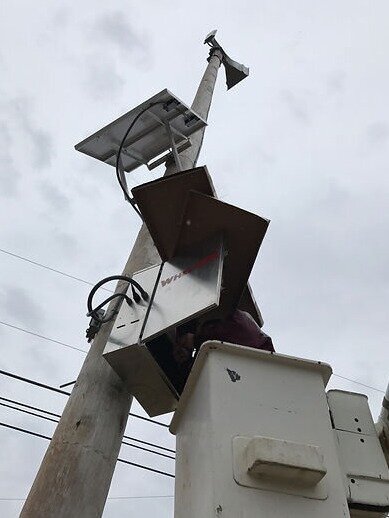 warning siren on pole